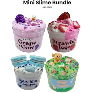 May include: A mini slime bundle featuring four different slime varieties in clear plastic containers. The slimes are decorated with various toppings and have labels that read "Grape Cow", "Strawbb Icee", "Baby Blue Macaron", and "Doggy Playtime".