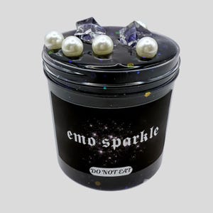 May include: Black slime with silver glitter and white pearls in a clear jar with a black label that says "emo sparkle" and "DO NOT EAT".