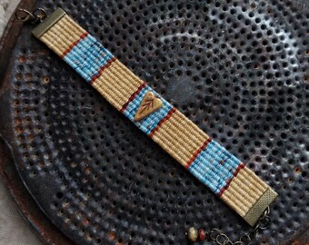 Striped hand woven bracelet, hand loomed, handpainted bead, adjustable bracelet, Southwestern colors, desert inspired