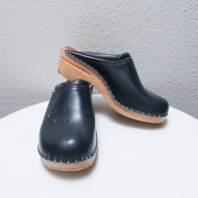 navy leather clogs