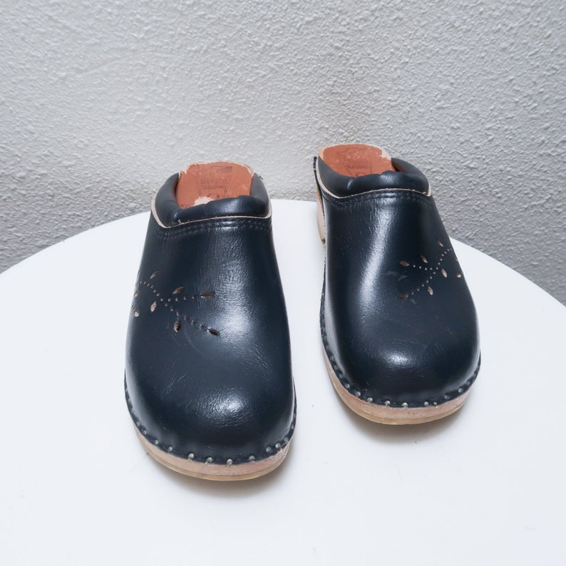 navy leather clogs
