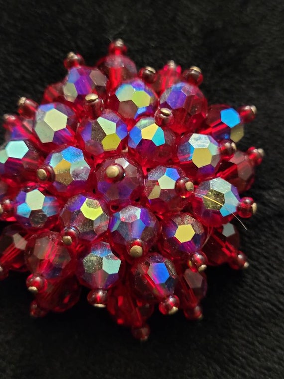 Iridescent red vintage or antique brooch or pin