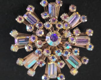 Antique or vintage iridescent aurora borealis crystal starburst pin or brooch