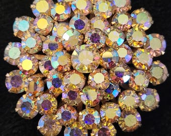 Antique or vintage iridescent aurora borealis round crystal pin or brooch, unmarked