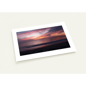 Paquete de 10 tarjetas de felicitación con puesta de sol en el océano para Navidad (EE. UU. y Canadá)