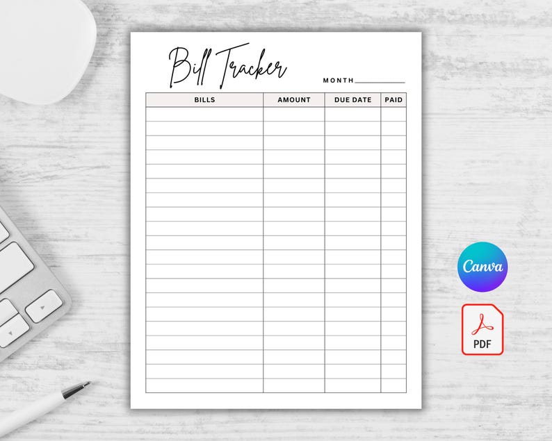 May include: A white bill tracker sheet with the title "Bill Tracker" in elegant script. The sheet has columns for bills, amount, due date, and paid. A keyboard, pen, and mouse are in the background.