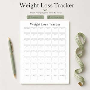 May include: A white paper weight loss tracker sheet with a grid of boxes labeled Week 01 through Week 52, plus Start Weight and End Weight fields. A sage green pen and a coiled measuring tape with imperial inch markings are placed beside the paper.