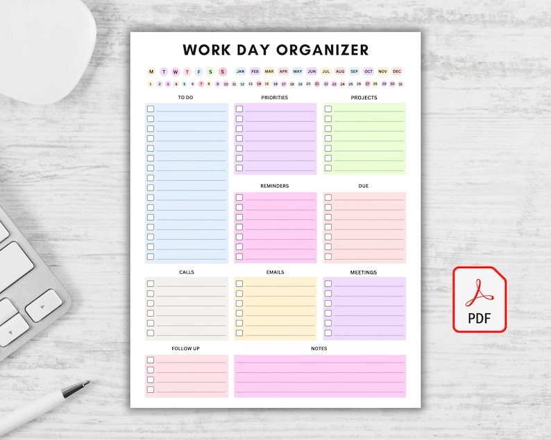 Op de afbeelding: Een witte Work Day Organizer planner met secties voor To Do, Prioriteiten, Projecten, Herinneringen, Vervaldatum, Oproepen, E-mails, Vergaderingen, Follow-up en Notities. De planner heeft een kleurrijk ontwerp en bevat een PDF-pictogram.