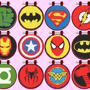 May include: Twelve round, colourful embroidered patches featuring various superhero logos, including Superman, Batman, Iron Man, Spiderman, The Flash, and Wonder Woman.