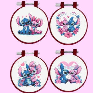 May include: Four embroidery hoops with cross-stitch designs featuring Stitch and Angel from the Disney movie Lilo & Stitch. The designs include Stitch and Angel holding hands, Stitch and Angel kissing, Stitch and Angel with a heart, and Stitch and Angel with a heart and flowers.
