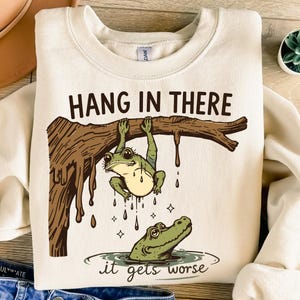 Hang In There It Gets Worse PNG, Funny Sarcastic Frog Png, Snarky Humor Png, Retro Aesthetic Png, Sassy Frog Png, Edgy Humor Png Snarky Frog