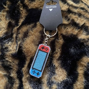 Hand stitched console keychain