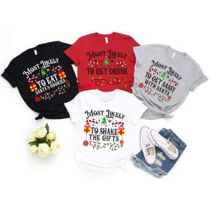May include: A collection of Christmas-themed t-shirts in black, red, white, and gray. Each shirt features the phrase "Most Likely" followed by a festive activity, such as "to eat Santa's cookies" or "to get drunk".