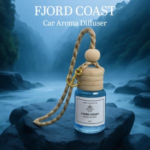May include: A car aroma diffuser with a blue liquid in a glass bottle. It features a wooden cap, a braided rope, and a gold anchor charm. The image displays the text "FJORD COAST" and "Car Aroma Diffuser".