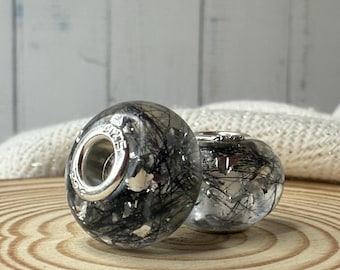 Großloch- Harzperle mit Tierhaare