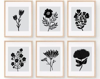 Arte de pared imprimible con motivos florales en blanco y negro