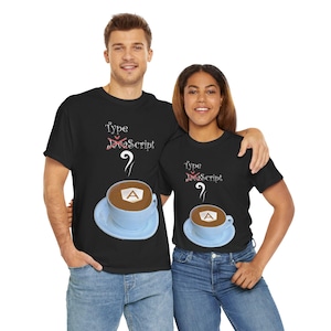 May include: Two people wearing black t-shirts with a coffee cup graphic and the text "Type JavaScript" on them. The coffee cup has a stylized "A" inside.