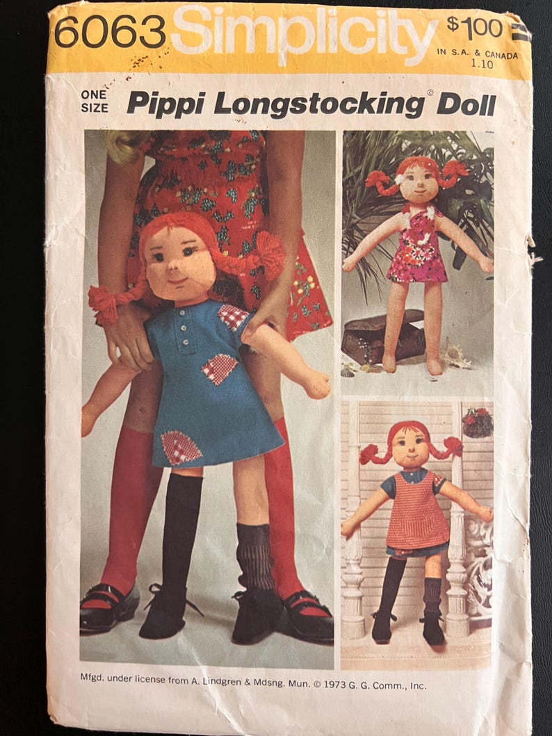 May include: Simplicity sewing pattern number 6063 for a Pippi Longstocking doll. The pattern includes instructions for making three different outfits for the doll, including a red and white dress, a blue and white dress, and a red and white pinafore dress. The pattern is for one size doll.