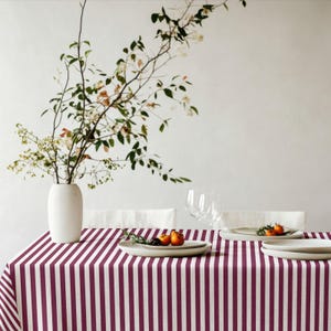 Bring warmth and character to your table with this burgundy stripe design.
Its vintage feel creates a welcoming dining experience.