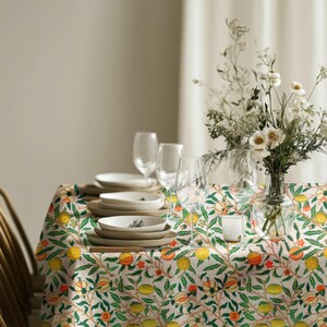 Citrus-themed rectangle tablecloth, adding a fresh Mediterranean touch to any kitchen or dining space.