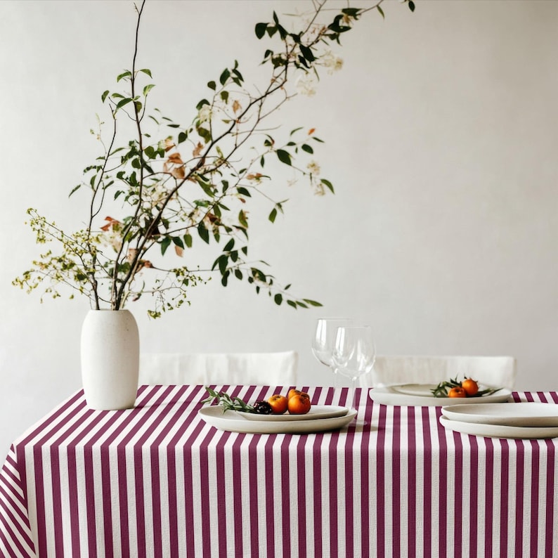 A vintage-inspired striped tablecloth that elevates both casual and special gatherings.
The rich burgundy tone pairs beautifully with neutral tableware.