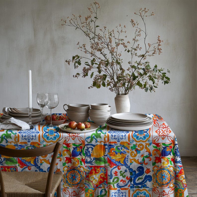 Vintage Sicilian tile print tablecloth, adding charm to farmhouse and coastal homes.