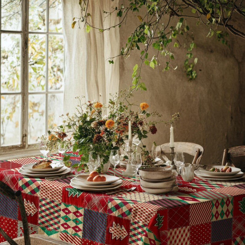 A holiday tablecloth featuring classic Christmas colors and patchwork design, ideal for family gatherings.