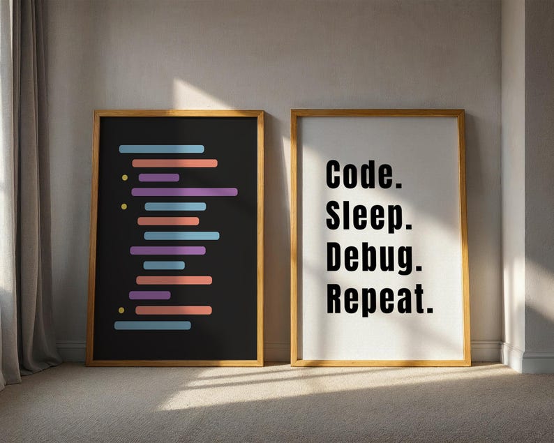 Peut inclure: Deux impressions encadr&eacute;es, l'une avec un fond noir et des lignes color&eacute;es, l'autre avec un fond blanc et le texte "Code. Sleep. Debug. Repeat."