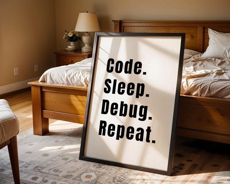 Peut inclure: Une affiche encadr&eacute;e noire avec un fond blanc et du texte noir qui dit "Code. Sleep. Debug. Repeat."