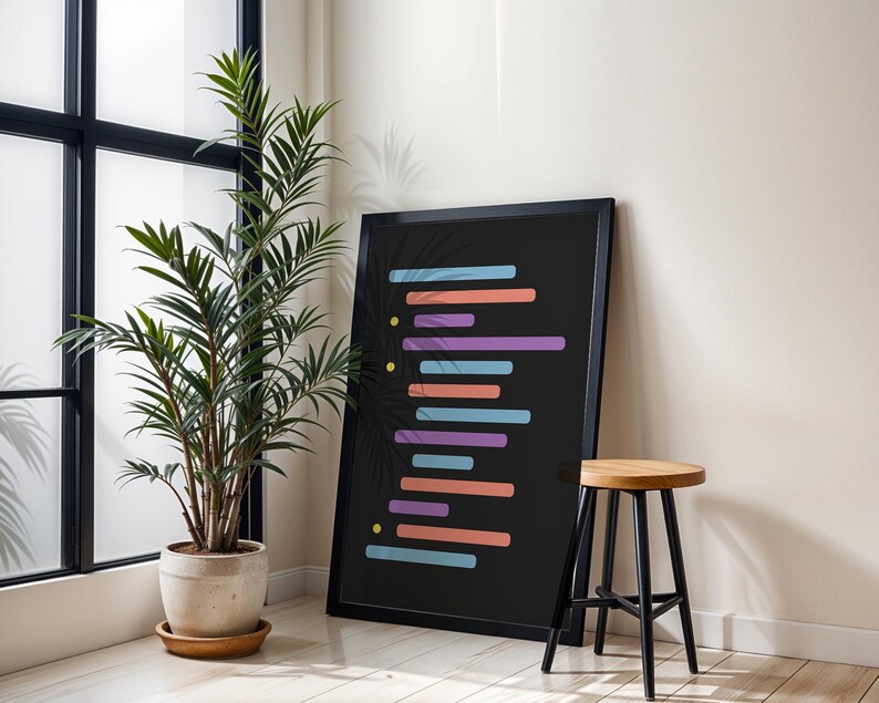 Peut inclure: Une impression encadr&eacute;e noire avec un motif abstrait color&eacute; de lignes horizontales dans des tons de bleu, violet et orange sur un fond noir.