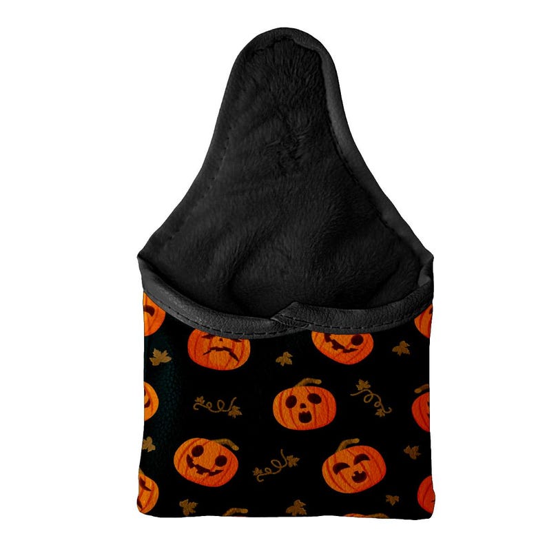 May include: Black Halloween-themed car seat organizer with a pumpkin pattern. The organizer features orange jack-o'-lanterns with various expressions on a black background. The top portion is black and plush.