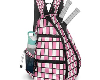 May include: Pink and white checkered tennis backpack with two tennis rackets. The backpack has a water bottle in the side pocket and the word "WATER" is visible on the side pocket. The backpack has black zippers and straps.