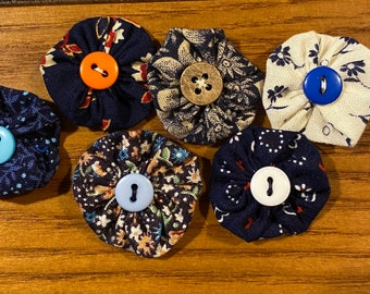 Set of 6 Yo Yo’s, various colors, approx 1” in diameter.