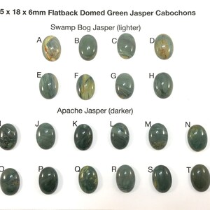 May include: Twenty-five green jasper cabochons, each measuring 25 x 18 x 6 mm. The cabochons are oval shaped and have a domed top. They are arranged in two rows, labeled "Swamp Bog Jasper (lighter)" and "Apache Jasper (darker)".