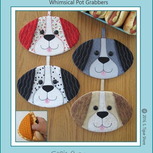 May include: Four whimsical pot grabbers shaped like dogs. Each dog has a different color and pattern. The dogs are all smiling and have their tongues sticking out. The text "Hot Dogs! ST-1628" is at the top of the image. The text "Whimsical Pot Grabbers" is below the text "Hot Dogs! ST-1628". The text "Susie C Shore Designs" is at the bottom of the image. The text "A Division Of Tigue Productions, Inc." is below the text "Susie C Shore Designs". The text "2016, S. Tigue Shore" is in the bottom right corner of the image. The text "R" is in the bottom right corner of the image.