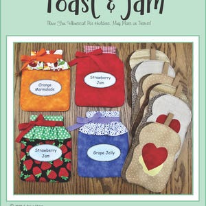 May include: A set of three quilted pot holders featuring a whimsical design of jars of jam and slices of toast. The pot holders are made of various fabrics with different patterns and colors, including red, orange, green, blue, and brown. The text "Toast & Jam" is printed at the top of the image.
