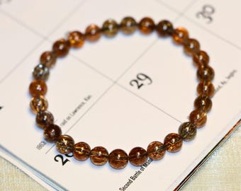 高品質の輝くブロンズ花火クォーツ「スーパーセブン」12 mm、10.5 mm
