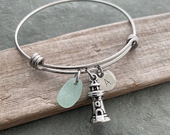 Lighthouse charm bracelet, stainless steel adjustable bangle with genuine sea glass, and hand stamped initial disc Beach glass jewelry