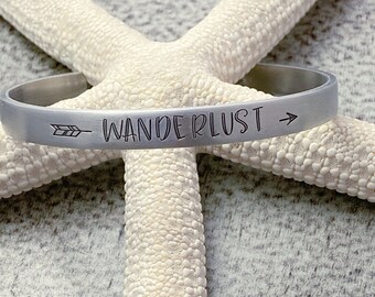 wanderlust -  Hand stamped aluminum bracelet, 1/4 Inch Bangle Silver tone Cuff Bracelet, Lightweight, Traveler - wanderer - arrow design