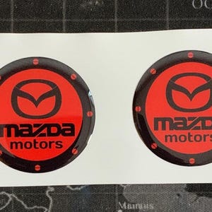 Excellent Quality / Set x 4 Self Adhesive Silicone Stickers Logo Mazda for Wheel Center Hub Caps / Rims Tuning / Epoxy Resin Emblem