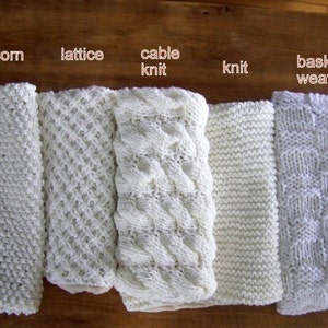 May include: Five white knitted fabric swatches with different stitch patterns. The swatches are labeled "popcorn knit", "lattice", "cable knit", "knit", and "basket weave".