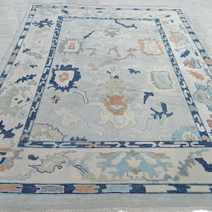7.11 x 9.8 ft Antique Oushak Rug: Hand-Knotted Turkish Wool Bedroom Rug