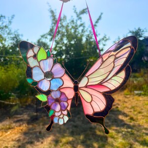 Pink butterfly with floral wing