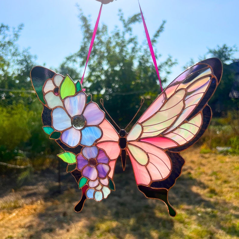 Pink butterfly with floral wing
