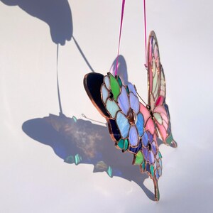 Pink butterfly suncaatcher