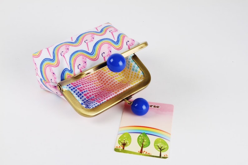 Mystical narwhal white Color dad Katy Tanis northern seas pink yellow Metal frame coin purse with color bobble