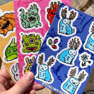 HOJAS DE PEGATINAS Adorables Monstruos Critters Halloween Conejitos Blupees Zelda 4"x6" hojas de pegatinas de vinilo impermeables resistentes a la intemperie varios diseños