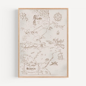 May include: A framed map of Narnia, a fictional land, illustrated in sepia tones. The map includes place names such as Narnia, Archenland, and Calormen. The frame is made of light-colored wood, and the map is in a rectangular shape.