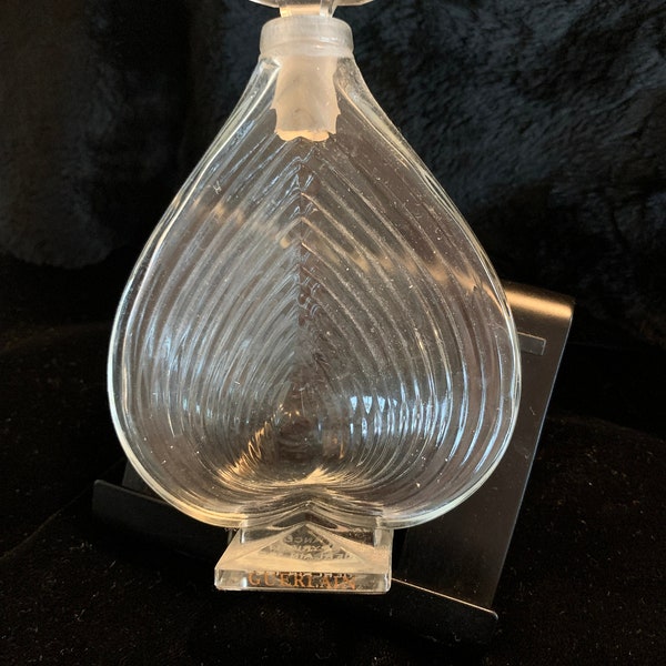 Empty Guerlain perfume bottle