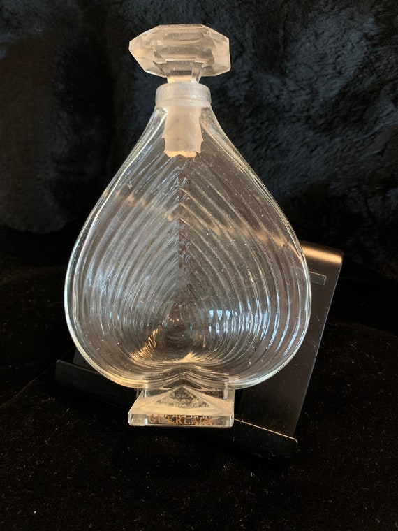 Empty Guerlain perfume bottle